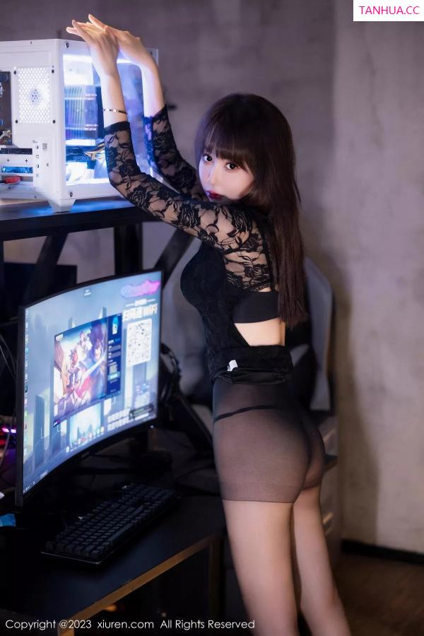   [XiuRen]高清写真图 2023.12.01 No.7751 韩系学妹 黑丝美腿第4张图片